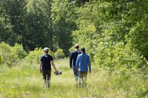 3 people walking away in Fitz prairie