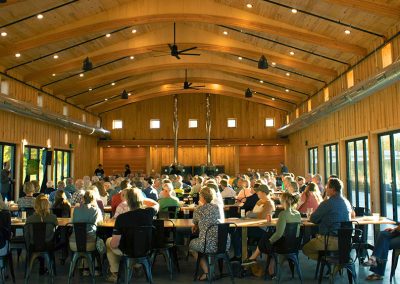 Group watching presentation at annual meeting