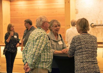 Enjoying a conversation during social hour