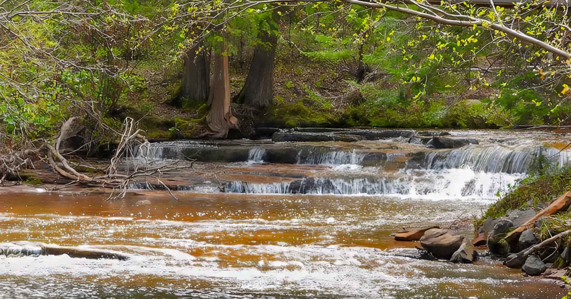 © Tom Andersen - The Siskiwit River here is a series of scenic falls and glides The Siskiwit River here is a series of scenic falls and glides